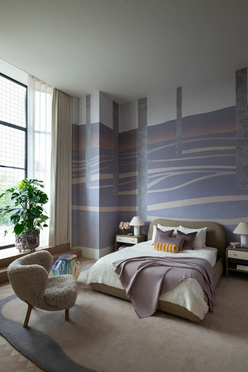angled view of modern bedroom with gray/purple abstract wallpaper