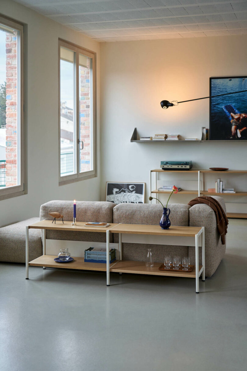 long sofa table behind a sofa in a living room